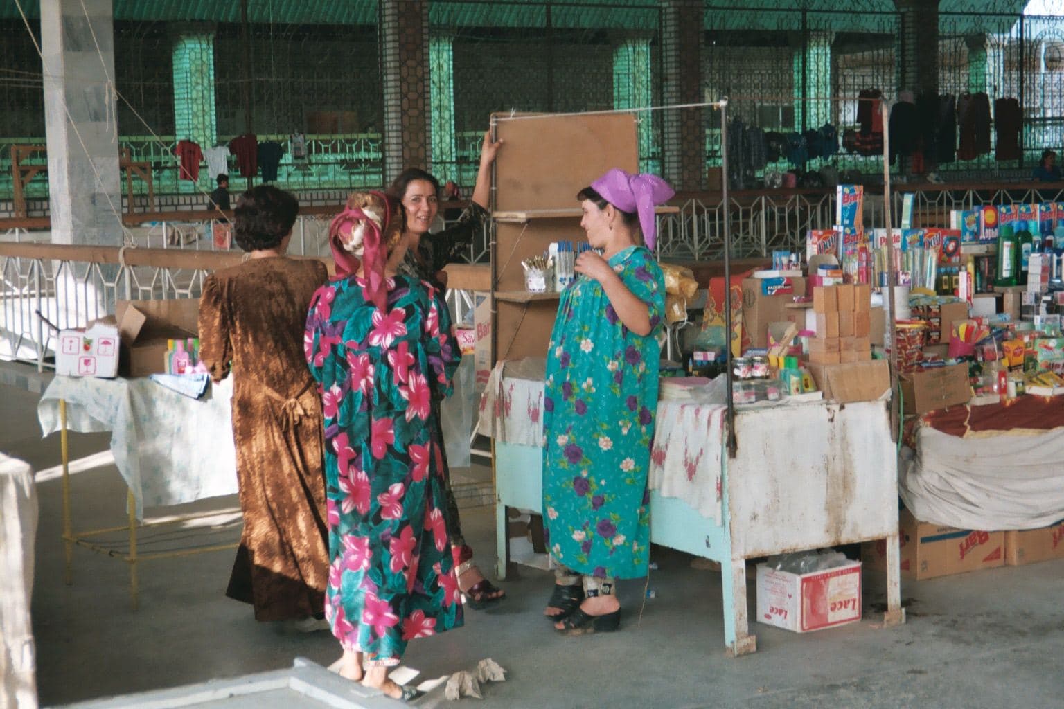 Stallholders at a covered market in Termez